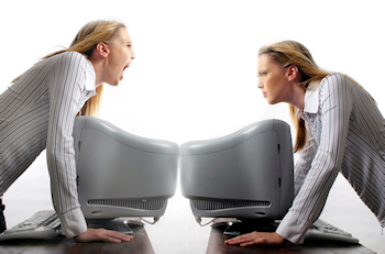 Two angry women stare at each other